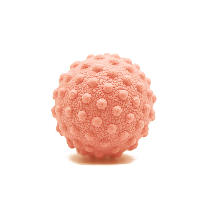 Textured acupoint massage grip ball in hand