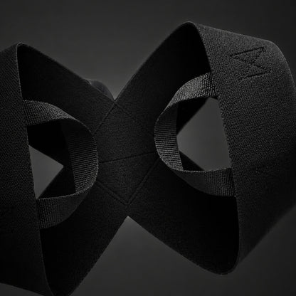 Black textured resistance band with interlocking design for fitness training